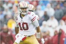  ?? ROB CARR/GETTY IMAGES ?? Jimmy Garoppolo, now in the second year of a five-year, Us$137.5-million contract, has guided the San Francisco 49ers to a surprising 6-0 start in the first month and a half of the NFL season.