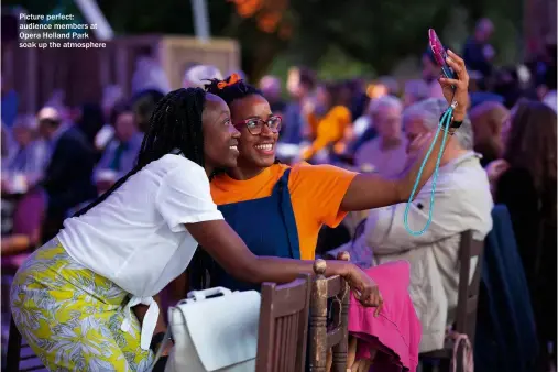  ?? ?? Picture perfect: audience members at Opera Holland Park soak up the atmosphere