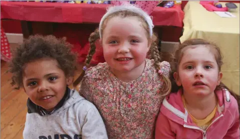  ??  ?? Rian Kinsella, Ella Smytn and Celia McCoy at the Foroige youth club Easter egg hunt in Ballinacla­sh community hall.