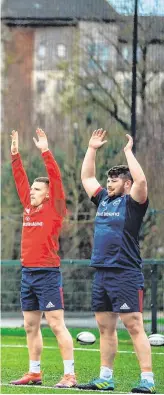  ?? DIARMUID GREENE/SPORTSFILE ?? From far left: Ciaran Parker in relaxed mood at training and going through his streches (far right) with teammates Sam Arnold, Arno Botha, Chris Farrell, Rory Scannell, Conor Murray, Darren O’Shea and Andrew Conway