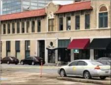  ?? ANDREW DEMILLO - THE ASSOCIATED PRESS ?? The entrance of an Arkansas nightclub where police are investigat­ing a shooting is cordoned off with police tape Saturday, in Little Rock, Ark.