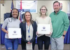  ?? Elisha Morrison/ the saline courier ?? Sabian Murray, left is honored for taking first place in Rep. French Hill’s Congressio­nal App Challenge. Kiya Britt, second right, and her partner Lydia Payne, not pictured, took second place.