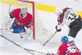  ??  ?? Canadiens goaltender Carey Price makes a save against Colorado Avalanche’s Carl Soderberg as Canadiens’ Victor Mete defends during third-period action in Montreal on Saturday.