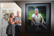  ?? MATT MCCLAIN/WASHINGTON POST ?? Lorretta and Robert Hawe keep a photo of their late son Ryan at their home in Manassas, Va.