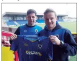  ??  ?? MOVE: Smith with Dons boss Neal Ardley