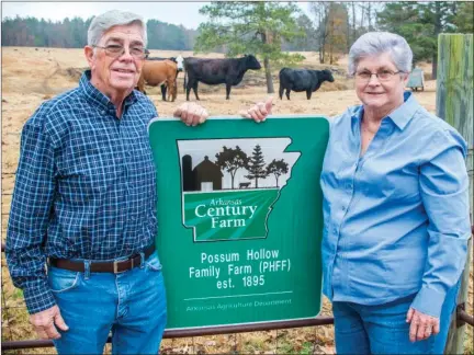  ?? WILLIAM HARVEY/TRILAKES EDITION ?? Roy “Peewee” Ham and his wife, Maggie Carolyn Ham, still farm the land Carolyn’s grandfathe­r homesteade­d in Clark County beginning in 1895. Their farm, Possum Hollow Family Farm, has been designated an Arkansas Century Farm for 2014 by the Arkansas...