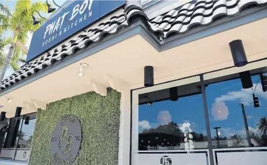  ?? AMY BETH BENNETT/SUN SENTINEL ?? Trendy Japanese mini-chain Phat Boy Sushi & Kitchen is closing its Oakland Park flagship to move into former Even Keel Fish & Oyster on March 1, chef-owner John Maser says.