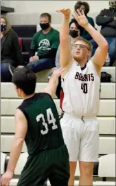  ?? PILOT PHOTO/RON HARAMIA ?? Dylan Murphy follows through on one of his three 3s during O-D’S win Monday night.