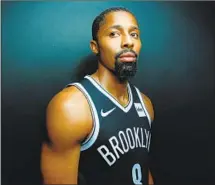  ?? Mike Stobe Getty Images ?? DINWIDDIE of the Brooklyn Nets has made a name for himself with his go-your-own-way sense of style, down to his shoes.