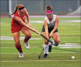  ?? THOMAS NASH - DIGITAL FIRST MEDIA ?? Owen J. Roberts’ Bridget Guinan, left, battles for possession with Methacton’s Frankie Lucchesi during Wednesday’s game.