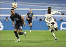  ?? / EPA ?? Mendy (Real) i Mahrez (Manchester City) na utakmici u Madridu