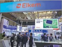  ?? ?? Visitors gather at Elkem’s booth at an electronic­s expo in Shanghai in April.