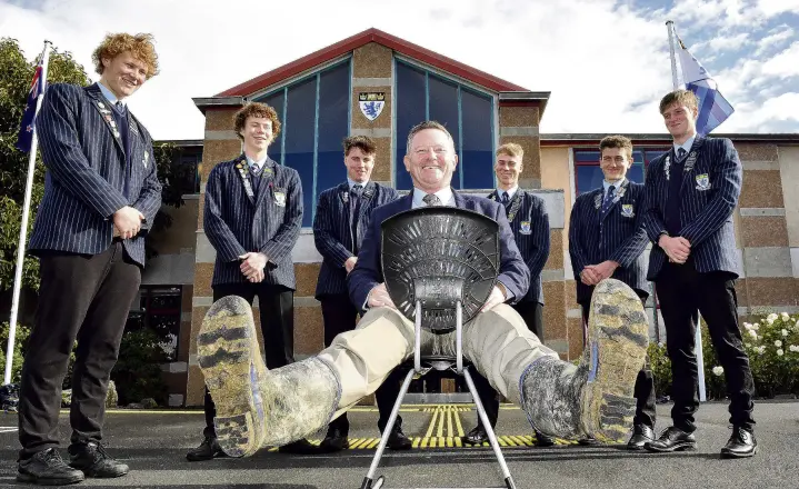  ?? PHOTO: STEPHEN JAQUIERY ?? Mucking in . . . King’s High School rector Nick McIvor has his boots ready to support about 50 of his pupils in the Gumboot Friday 24hour run this week, which aims to raise funds for youth mental health support.