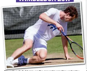  ??  ?? Struggling: Andy Murray on the ground in practice yesterday