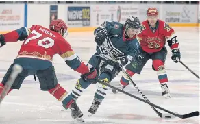  ??  ?? Stars’ Gabriel Levesque cuts inside Capitals Rihards Grigors during the Dundee side’s victory on Wednesday night.