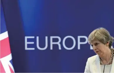  ??  ?? British Prime Minister Theresa May addresses a news conference at the EU summit in Brussels, Belgium, June 23, 2017, where she sets out the UK’S opening offer on the rights of EU citizens after its exit from the Union.