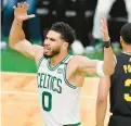  ?? STEVEN SENNE/AP ?? Celtics forward Jayson Tatum reacts during the fourth quarter of Game 4 of the NBA Finals against the Warriors on Friday in Boston.