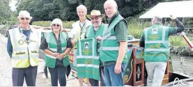  ?? PHOTOS: FCC ?? Amber Valley Rotary Club presenting Birdswood crew members with their new green hi-viz vests.