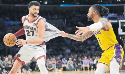  ?? ASHLEY LANDIS THE ASSOCIATED PRESS FILE PHOTO ?? Jamal Murray was difficult to contain in Denver’s sweep of the Western Conference final, as Los Angeles Lakers guard D'Angelo Russell discovered.