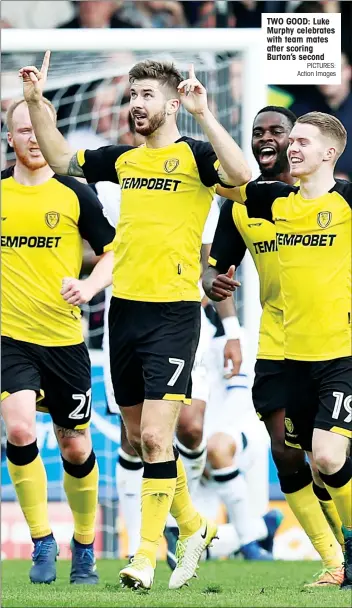  ?? PICTURES: Action Images ?? TWO GOOD: Luke Murphy celebrates with team mates after scoring Burton’s second