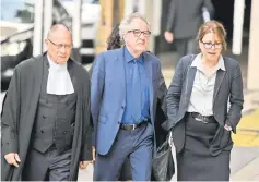  ??  ?? Geoffrey Rush arrives at the Federal Court in Sydney on Monday. — Reuters photo