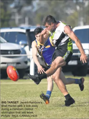  ??  ?? BIG TARGET: Jeparit-rainbow’s Brad Hunter gets a kick away during a Horsham District eliminatio­n final last week. Picture: PAUL CARRACHER