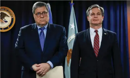  ??  ?? William Barr and FBI Director Christophe­r Wray on 18 December 2019 in Detroit, Michigan. Photograph: Bill Pugliano/Getty Images