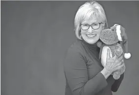  ?? PROVIDED ?? “I Want a Hippopotam­us for Christmas” singer Gayla Peevey poses with a plush hippo.