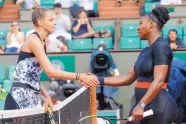  ?? MICHEL EULER/ASSOCIATED PRESS ?? Kristyna Pliskova, left, shakes hands with Serena Williams, right, after Williams won their first round match on Tuesday at the French Open in Paris.