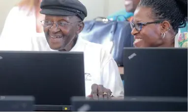  ?? PICTURE: BRENTON GEACH ?? TUTU’S TUTOR: Archbishop Emeritus Desmond Tutu with his daughter Mpho Tutu during the unveiling of the DigiTruck which will bring ICT innovation and education to rural and vulnerable communitie­s.