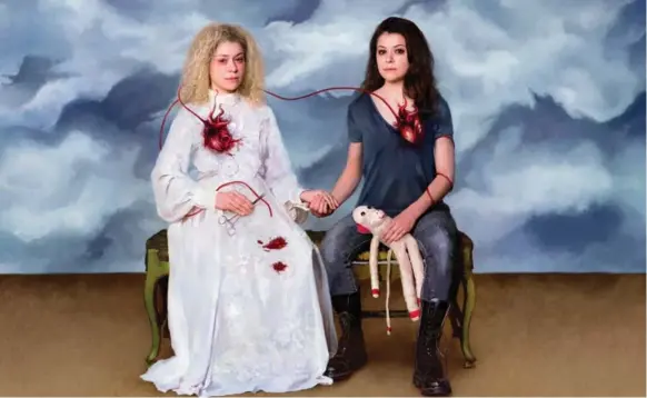  ?? BELL MEDIA ?? In an imitation of the Frida Kahlo painting The Two Fridas, Tatiana Maslany appears as two of the many clones she plays on Orphan Black, Helena, left, and Sarah Manning.