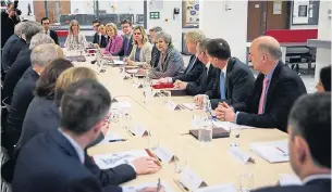  ??  ?? Mrs May, pictured at yesterday’s regional Cabinet meeting, is ready to respond