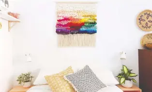  ?? PHOTO COURTESY OF NOVA MERCURY ?? Jennifer Duffin’s wall hangings, like this chunky woven piece with rainbow colours, add character and style to any space, plus texture and warmth to walls.