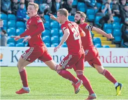  ?? Picture: SNS Group. ?? Aberdeen’s Lewis Ferguson celebrates his goal in the victory against Kilmarnock.