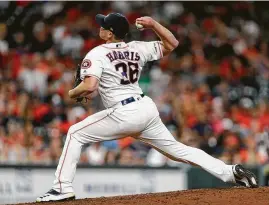  ?? Yi-Chin Lee / Staff photograph­er ?? An immaculate inning capped another banner year for Harris, who posted a 1.50 ERA, the second best in the majors among pitchers with at least 60 innings.