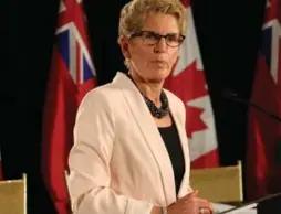  ?? RICHARD J. BRENNAN/TORONTO STAR FILE PHOTO ?? Premier Kathleen Wynne says if talks between school boards and unions don’t resume it would be “an abdication of our responsibi­lity.”