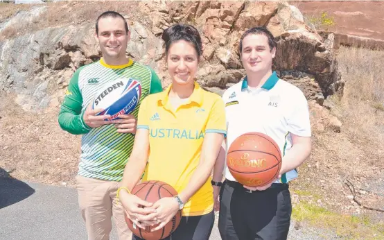  ??  ?? HAVING BALL: Townsville sports medicos Chris Ball, Simone Page and Brendon Aubrey are team doctors for the Kangaroos, Opals and the Boomers.