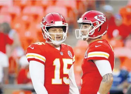  ?? CHARLIE RIEDEL/AP ?? Former Dolphins quarterbac­k Chad Henne, right, has found a role as backup in Kansas City to Patrick Mahomes.
