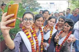  ??  ?? Students of SKD Academy (Lucknow) in jubilation mode after the UP Board exam results.