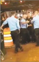  ?? @WILL_TOOILL/INSTAGRAM/ ?? Firefighte­rs outside Billy’s Bar in the Bronx get rowdy at Medal Day party in June.