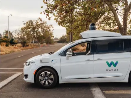  ?? COURTESY OF WAYMO ?? A Waymo self-driving van is seen in California. Waymo is limiting its trials to a region around Phoenix.