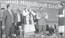  ?? —ANI ?? Shah at the North East Handloom and Handicraft Exhibition in Aizawl.