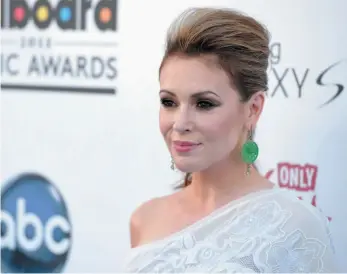  ?? AP FILE PHOTO ?? Alyssa Milano arrives at the Billboard Music Awards at the MGM Grand Garden Arena in Las Vegas in May 2013. Thousands of women responded to Milano’s call on Sunday to tweet “me too” in order to raise awareness of sexual harassment and assault following...