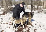  ?? Contribute­d photo / John Brennan ?? John Brennan and his dog Emma, right, were inseparabl­e. When Emma broke free from a pet sitter, he spent six weeks relentless­ly trying to get her back.