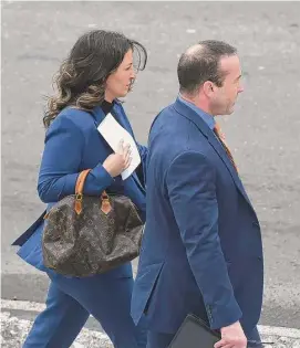  ?? H John Voorhees III/Hearst Connecticu­t Media ?? Andie Rosafort leaves state Superior Court in Danbury on Wednesday. Rosafort, a former cafeteria aide with the New Fairfield Public Schools, appeared in court after she was charged with sexually assaulting a student.