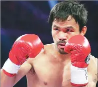  ?? FILE PHOTO ?? Philippine boxing great Manny Pacquiao defends his WBO welterweig­ht title against Australian Jeff Horn in Brisbane on Sunday.