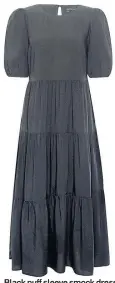  ??  ?? Black puff sleeve smock dress with sustainabl­e viscose, £38, Dorothy Perkins