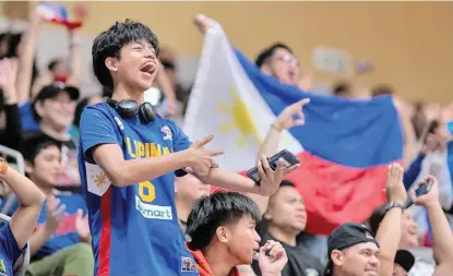  ?? FIBA PHOTO ?? GILAS ADVANTAGE. Gilas Pilipinas coach Tim Cone credits the Filipino fans for their lopsided 94-64 win over Hong Kong in their Fiba Asia Cup 2025 Qualifiers 1st Window Group B match on Thursday night, February 22, 2024, at the Tsuen Wan Stadium.
