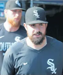  ?? JOHN J. KIM/CHICAGO TRIBUNE ?? White Sox pitcher Carlos Rodon leaves the dugout for a workout at Guaranteed Rate Field on Saturday.