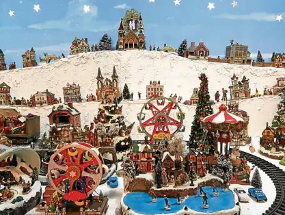  ??  ?? The Christmas village has been an attraction in the Reodica home for nearly two decades.